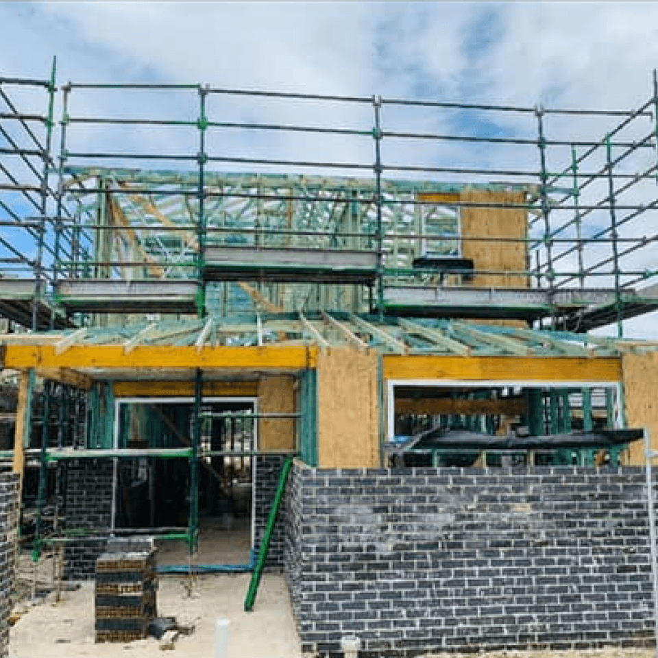 Scaffold access around dwellings on Ventura Street, Schofields
