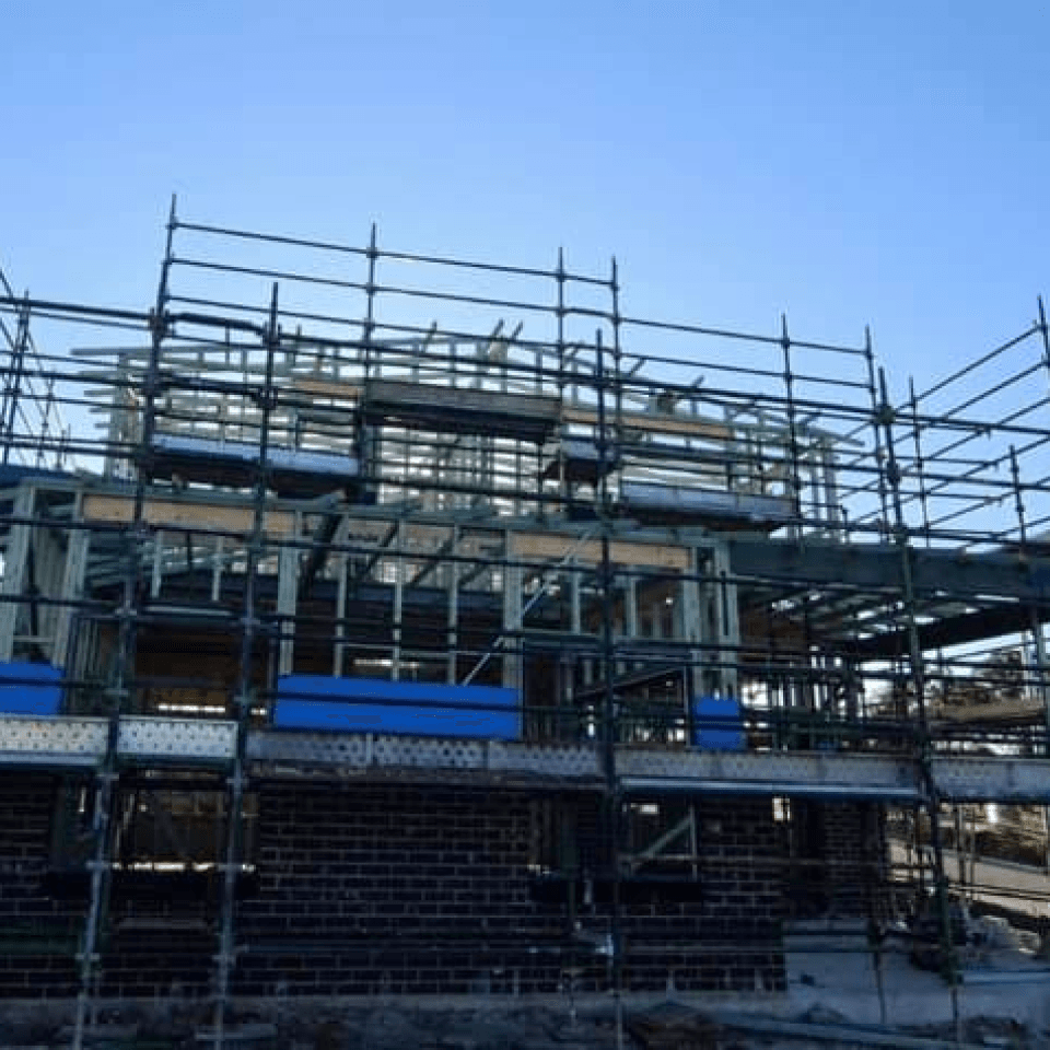 Wide view of scaffolding across the Kellyville subdivision project